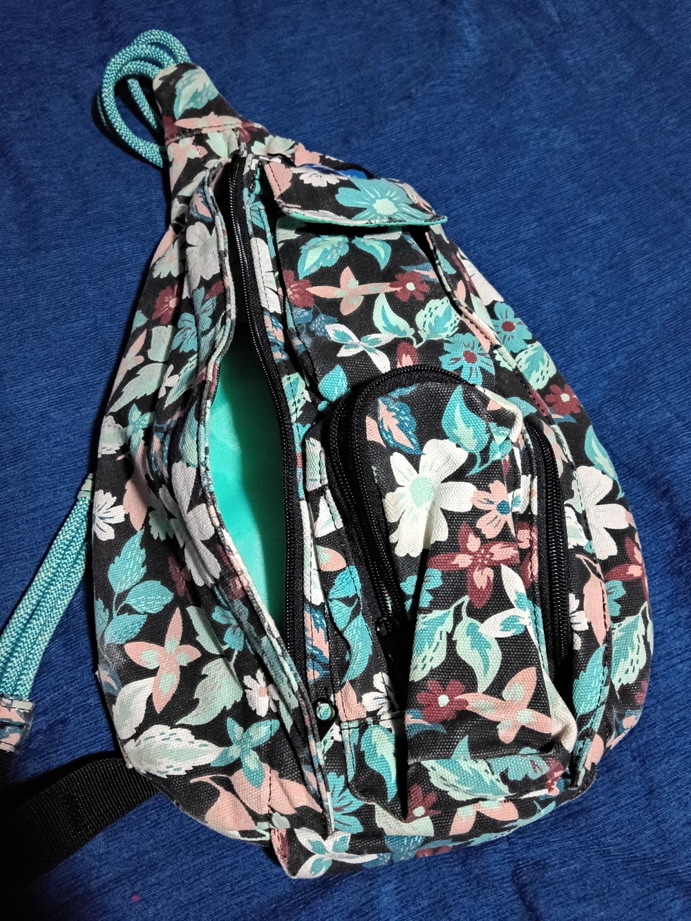 Kavu Floral Sling Backpack in Black, Mint & Pink